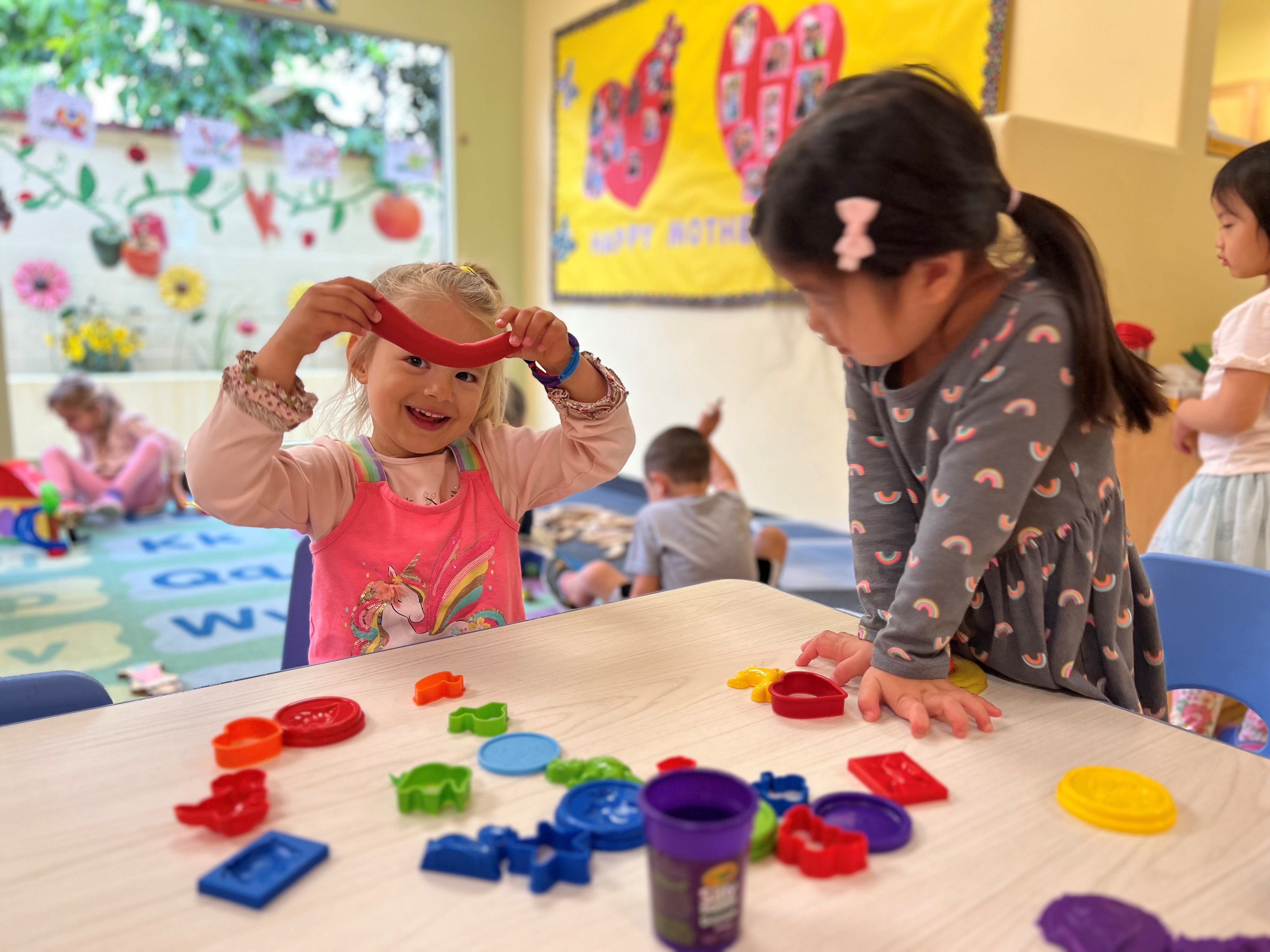 Kids Adventure Learning Center in Anaheim preschool Engaged students exploring hands-on activities at Preschool in Anaheim