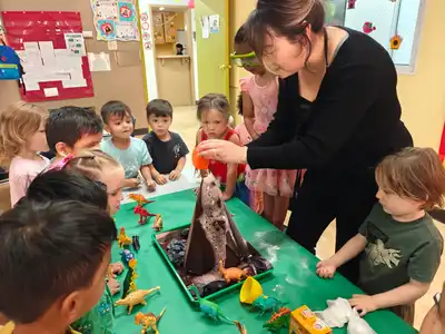 Preschool children exploring hands-on STEAM activities including science experiments and engineering projects at Kids Adventure Learning Center