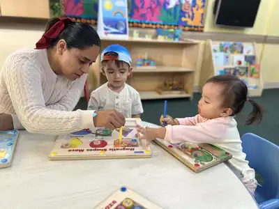 Toddlers at Kids Adventure Learning Center ages 18-36 months engaged in creative play-based learning exploration