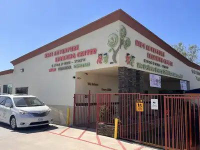 Secure preschool facility entrance with digital screening, CCTV monitoring, and controlled access for child safety at Kids Adventure Learning Center